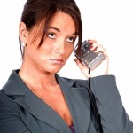 woman holding iphone away from ear