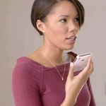 woman using iphone speaker