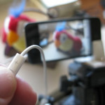 capturing photos with earbuds remote control