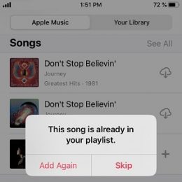 Apple Music duplicate song in Playlist warning.