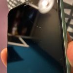 iphone 11 midnight green with 2 inch scratch